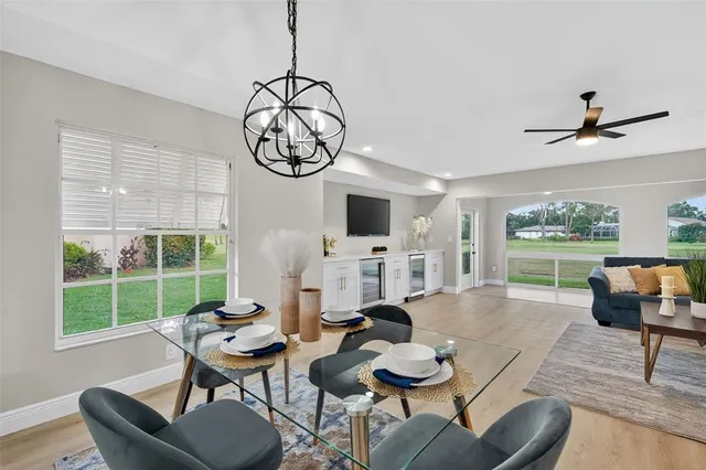 a living room with fireplace furniture and a window