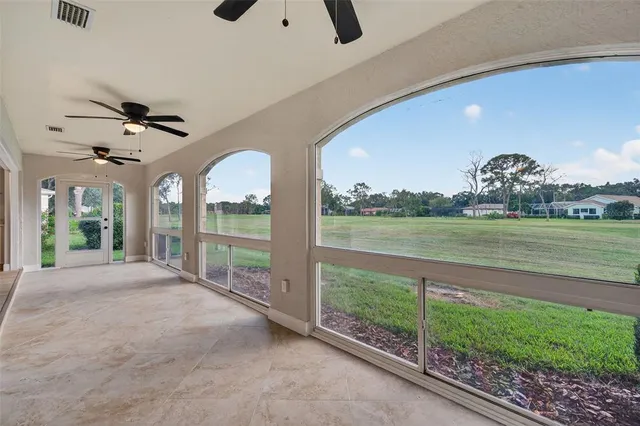 a view of a livingroom with furniture and garden