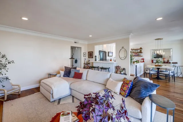 a kitchen with stainless steel appliances kitchen island granite countertop lots of counter top space and furniture