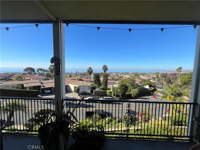 a view of a balcony with city view