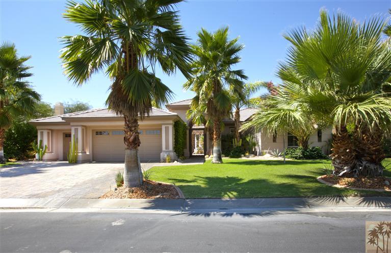 59 Calle Del Norte Rancho Mirage, CA 92270 - Photo 2 of 25 a front view of house with yard and green space
