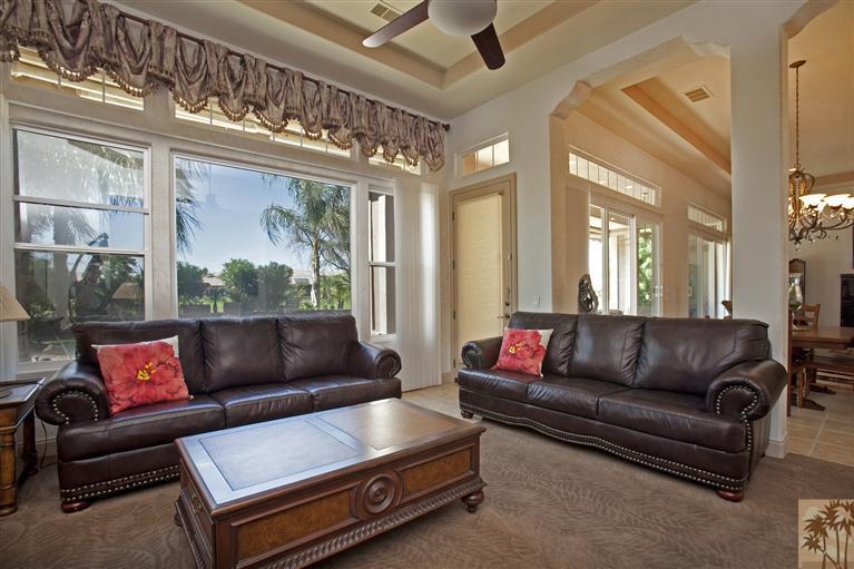 59 Calle Del Norte Rancho Mirage, CA 92270 - Photo 13 of 25 a living room with furniture and a large window