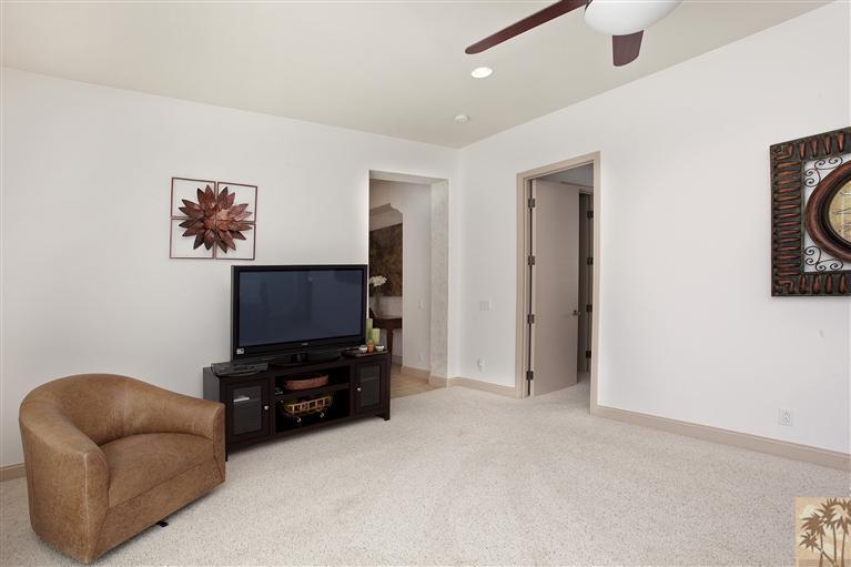 59 Calle Del Norte Rancho Mirage, CA 92270 - Photo 18 of 25 a living room with furniture and a flat screen tv