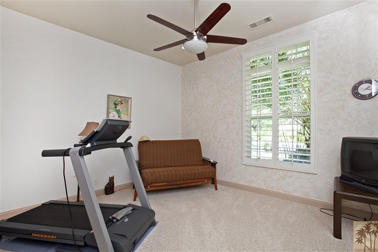 59 Calle Del Norte Rancho Mirage, CA 92270 - Photo 19 of 25 a room with gym equipment and a window