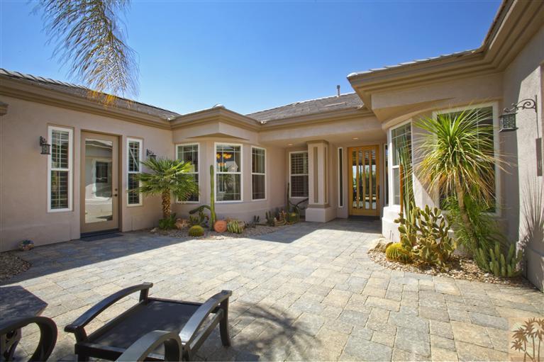 59 Calle Del Norte Rancho Mirage, CA 92270 - Photo 3 of 25 a view of house with patio outdoor seating and plants