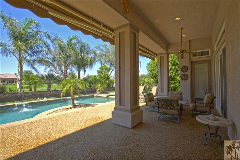 59 Calle Del Norte Rancho Mirage, CA 92270 - Photo 21 of 25 a swimming pool with outdoor seating and yard