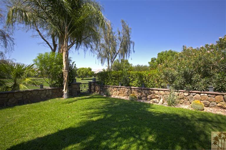 59 Calle Del Norte Rancho Mirage, CA 92270 - Photo 22 of 25 a view of a park with a tree in the background