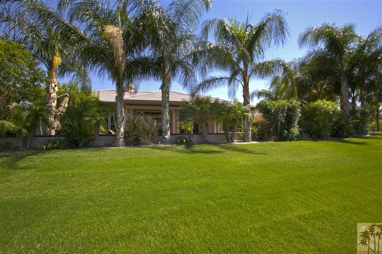 59 Calle Del Norte Rancho Mirage, CA 92270 - Photo 23 of 25 a swimming pool with palm trees