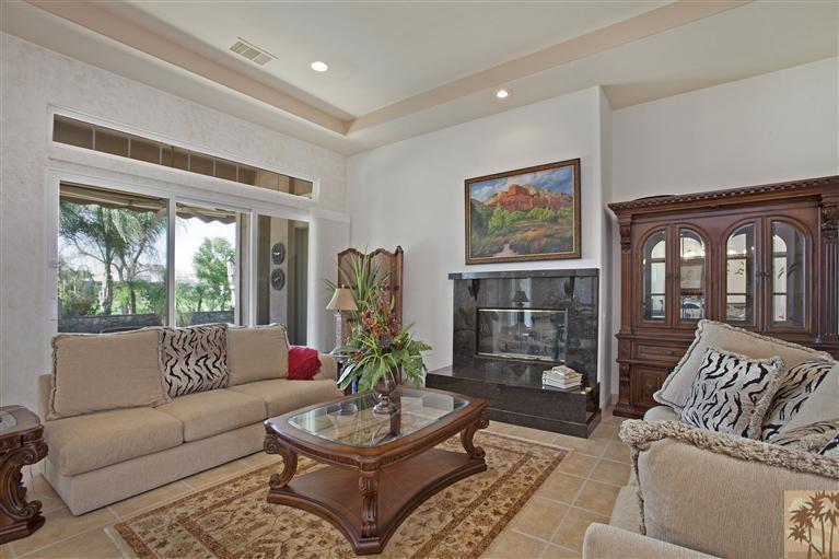 59 Calle Del Norte Rancho Mirage, CA 92270 - Photo 6 of 25 a living room with furniture and a large window