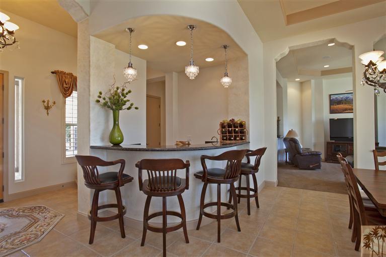 59 Calle Del Norte Rancho Mirage, CA 92270 - Photo 9 of 25 a view of a dining room with furniture