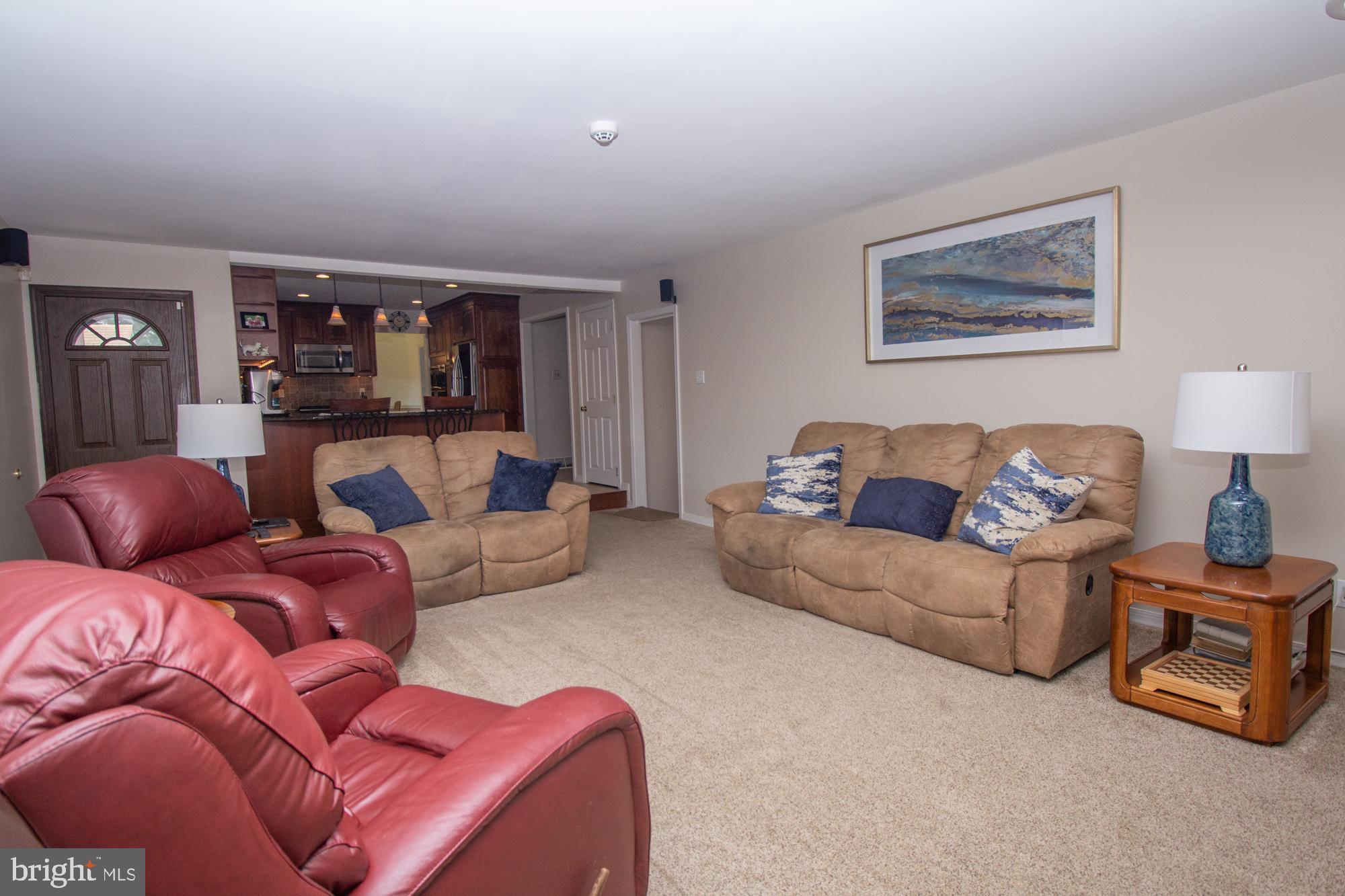 518 Ehret Road Fairless Hills, PA 19030 - Photo 16 of 37 a living room with furniture and a flat screen tv