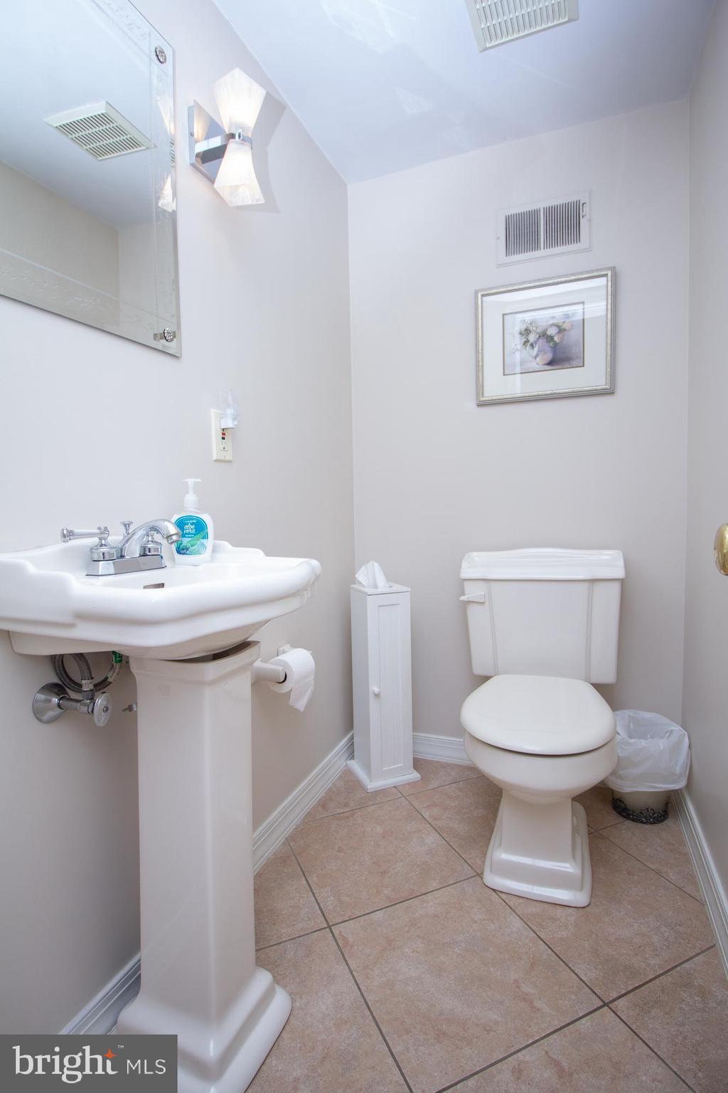 518 Ehret Road Fairless Hills, PA 19030 - Photo 17 of 37 a white toilet sitting next to a bathroom sink
