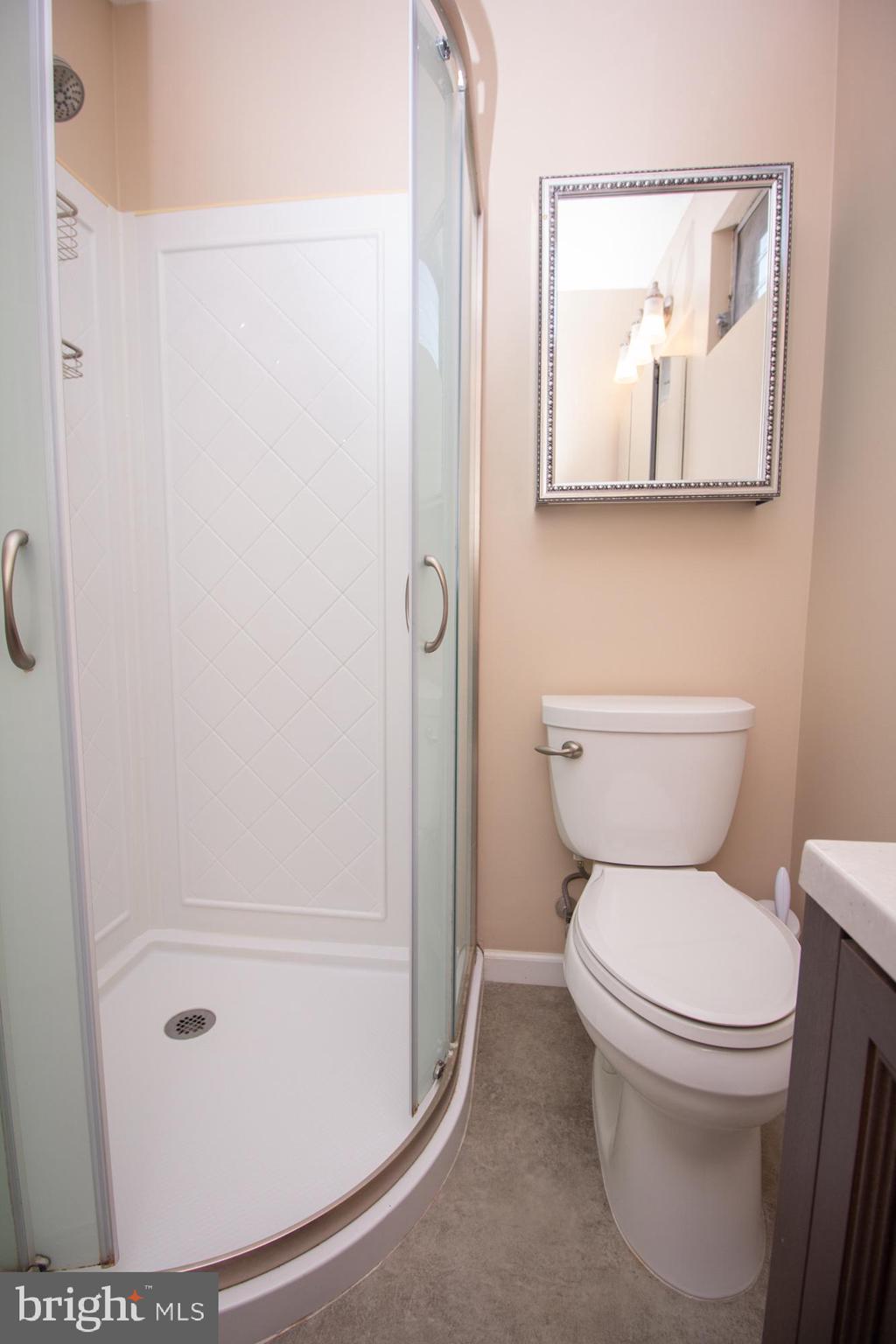 518 Ehret Road Fairless Hills, PA 19030 - Photo 20 of 37 a bathroom with a toilet and a shower curtain