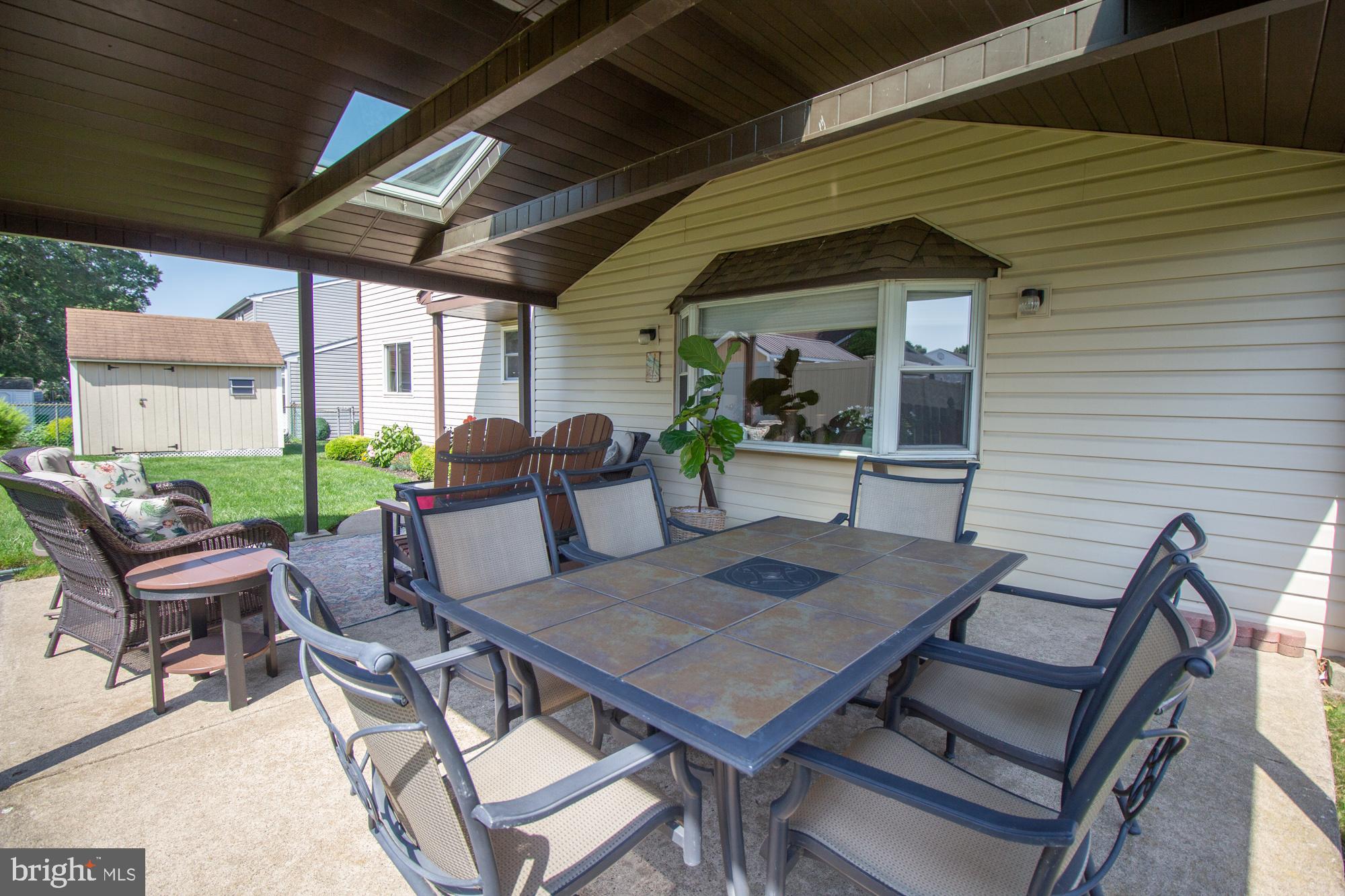 518 Ehret Road Fairless Hills, PA 19030 - Photo 33 of 37 a view of a patio with table and chairs and potted plants