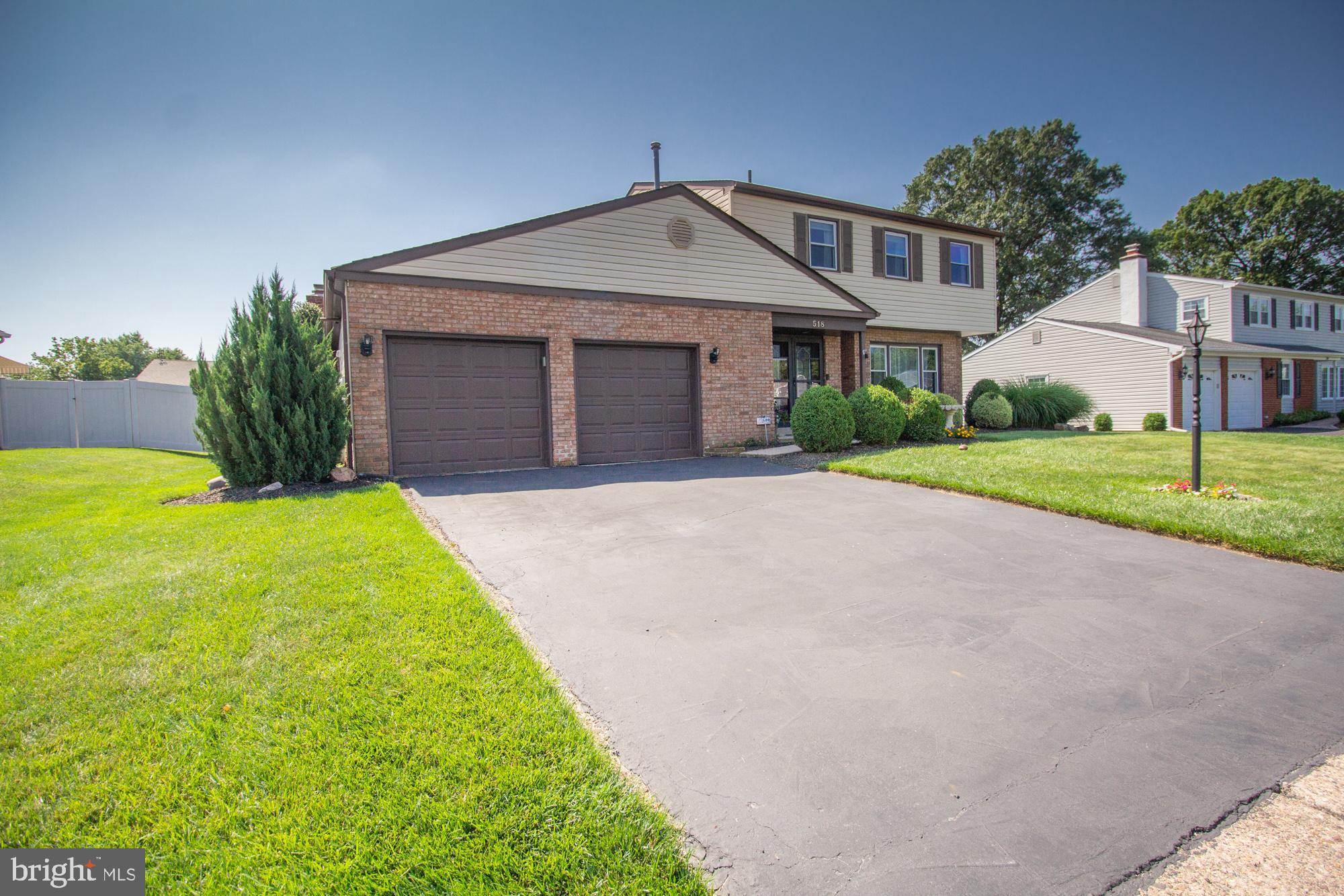 518 Ehret Road Fairless Hills, PA 19030 - Photo 36 of 37 a front view of a house with a yard and garage