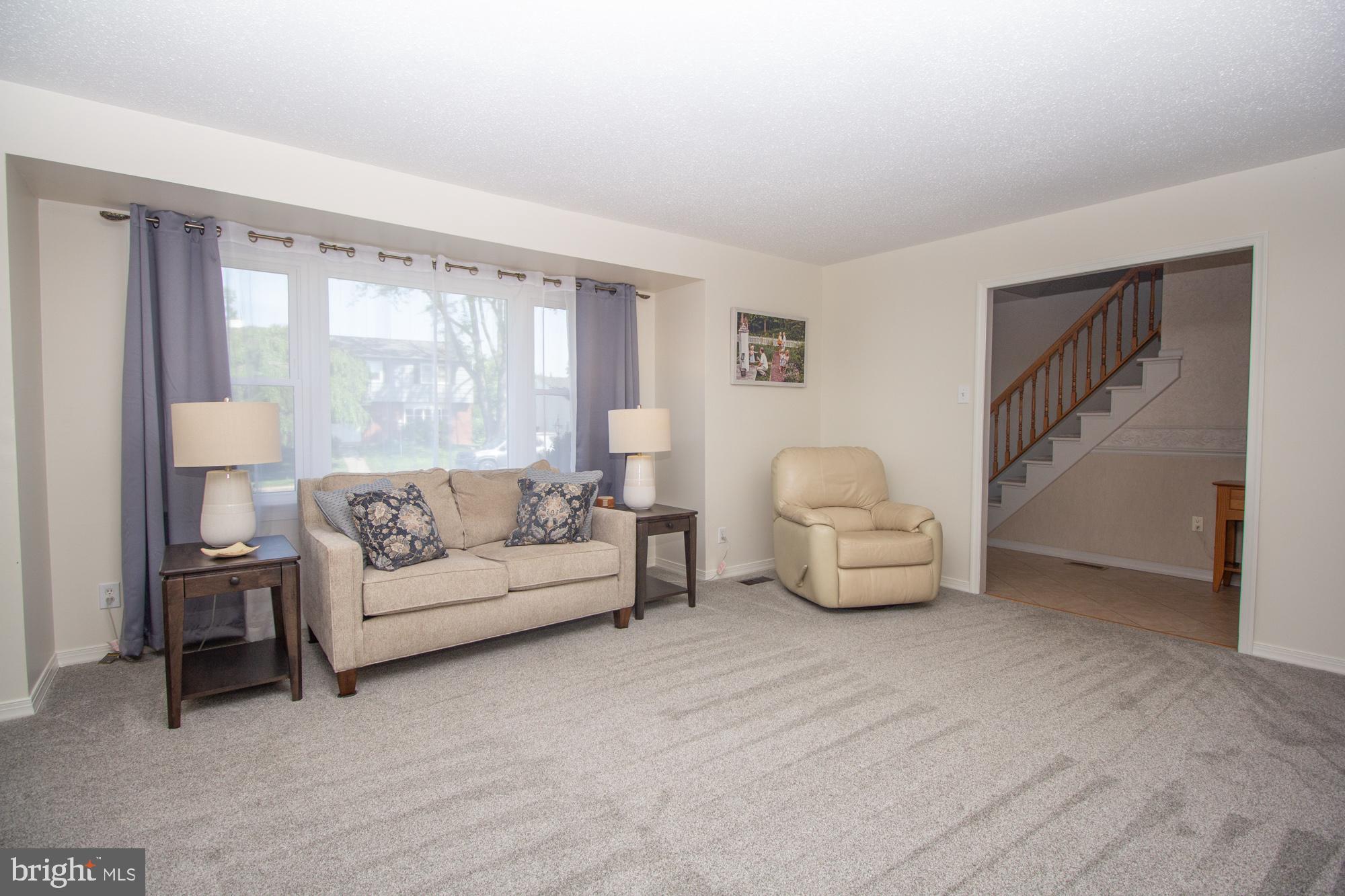 518 Ehret Road Fairless Hills, PA 19030 - Photo 8 of 37 a living room with furniture and a large window