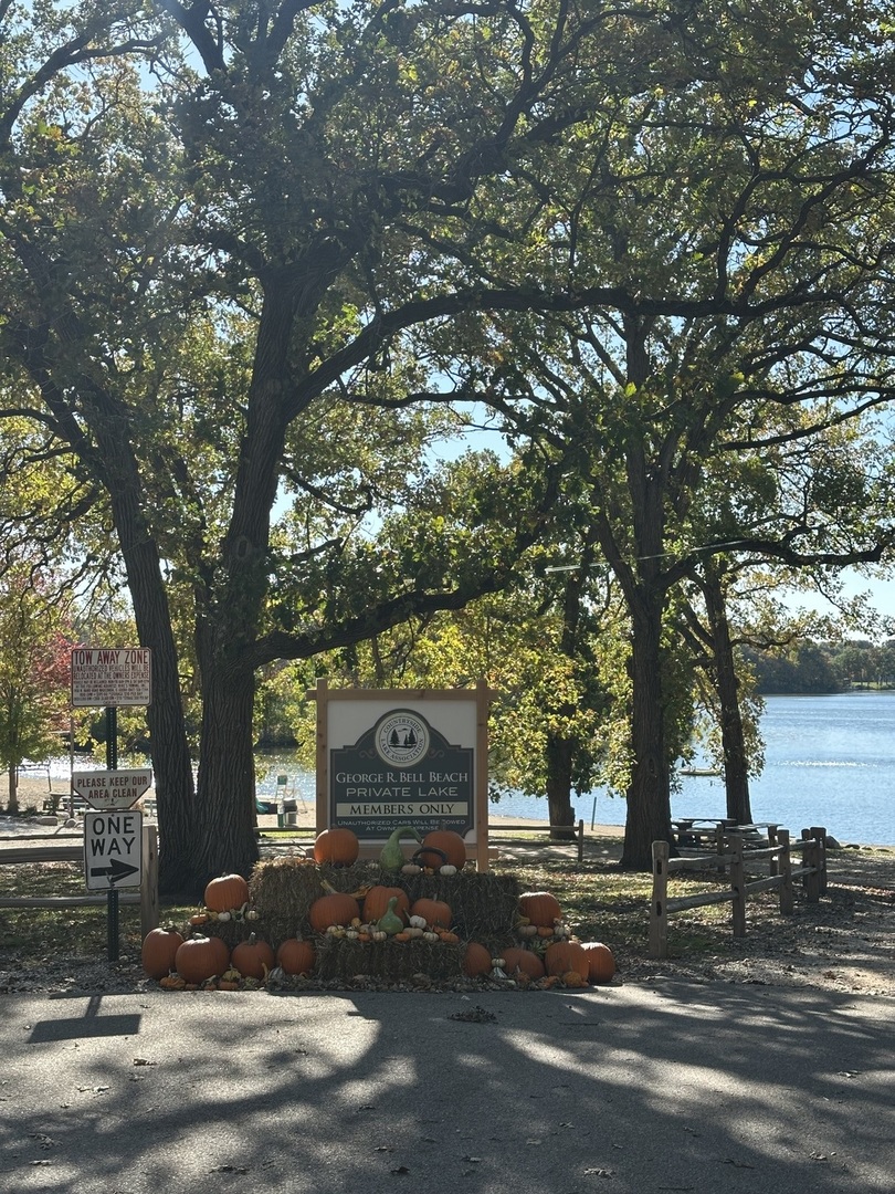 26220 North Midlothian Road Mundelein, IL 60060 - Photo 9 of 19 a sign board tree in front of a building
