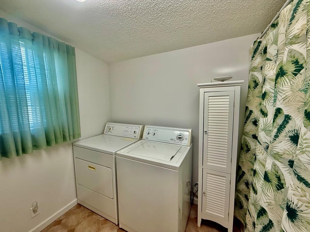 180 Center Drive Springville, TN 38256 - Photo 15 of 30 a utility room with dryer and washer