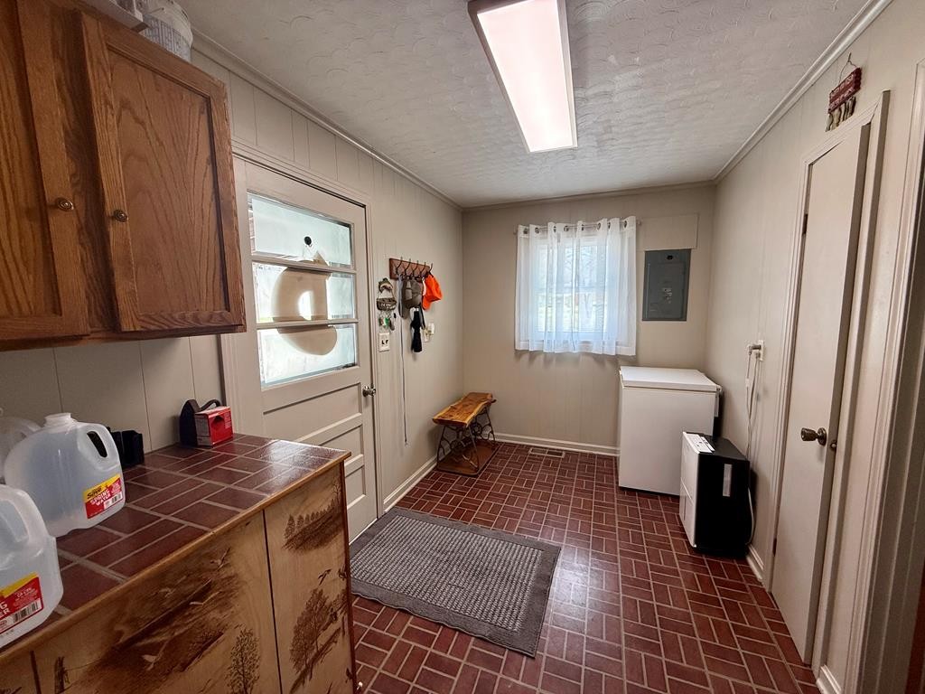 180 Center Drive Springville, TN 38256 - Photo 16 of 30 a hallway with a view of bedroom with a window