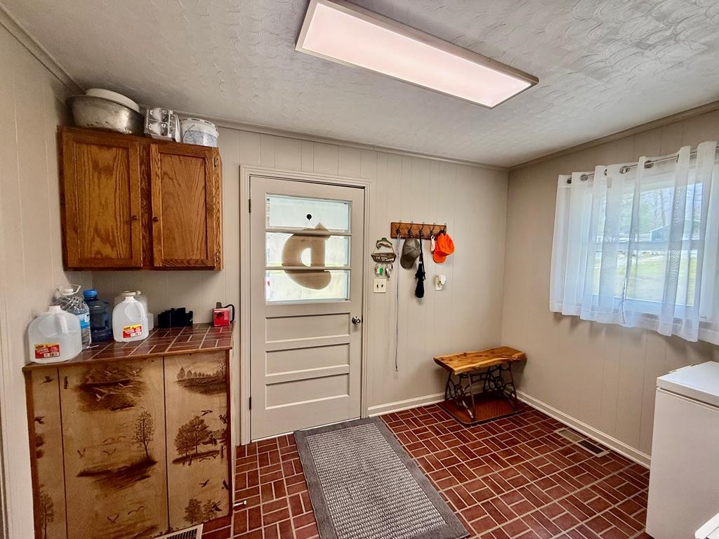 180 Center Drive Springville, TN 38256 - Photo 17 of 30 a room with storage and utility