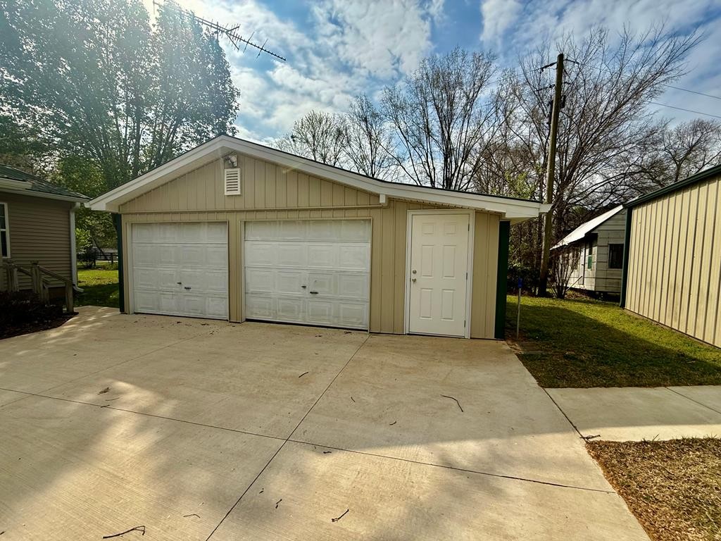 180 Center Drive Springville, TN 38256 - Photo 21 of 30 a view of garage yard and garage