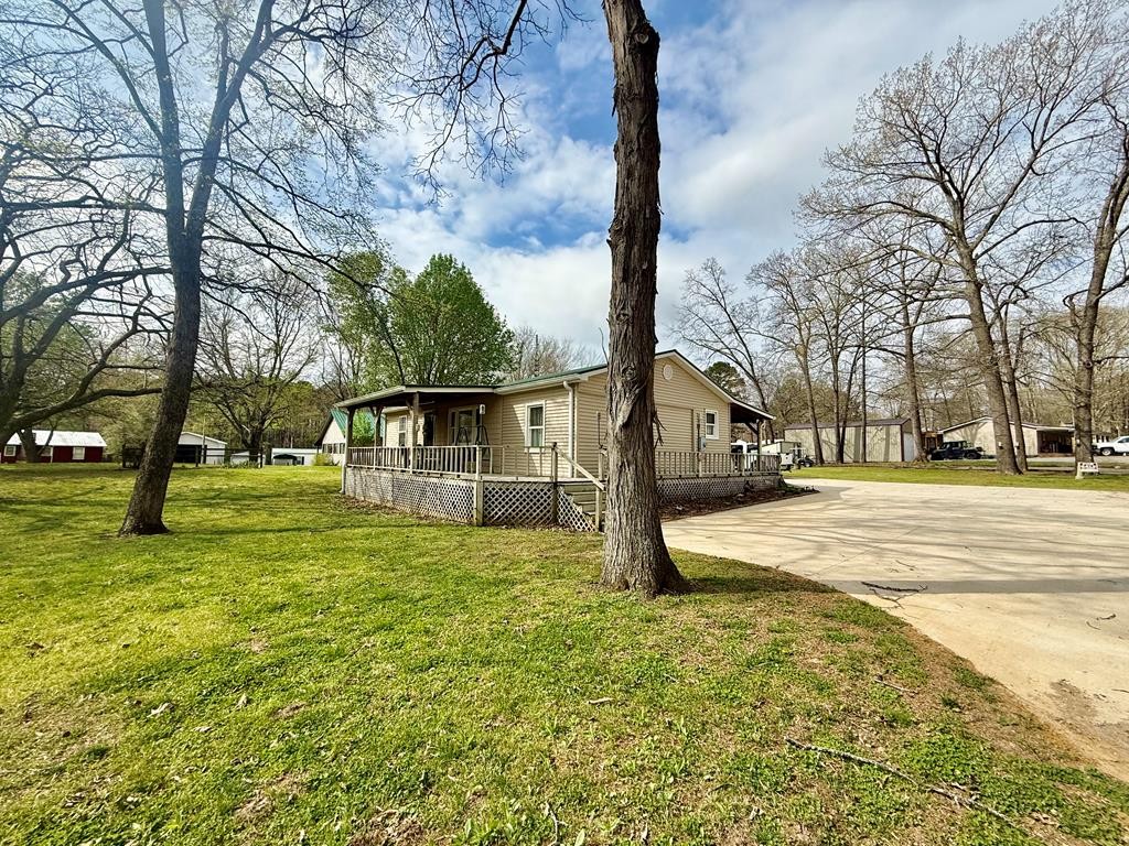 180 Center Drive Springville, TN 38256 - Photo 28 of 30 a view of a house with a yard