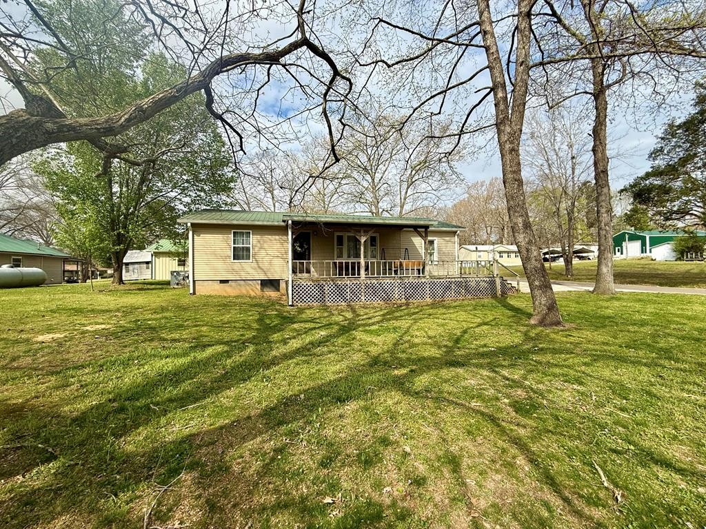180 Center Drive Springville, TN 38256 - Photo 29 of 30 a front view of a house with a yard
