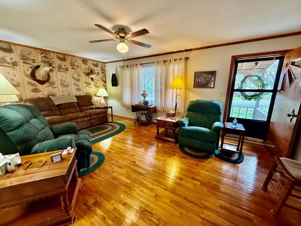 180 Center Drive Springville, TN 38256 - Photo 3 of 30 a living room with furniture and a large window