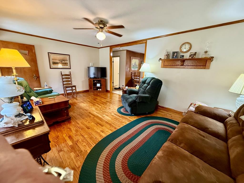 180 Center Drive Springville, TN 38256 - Photo 4 of 30 a living room with furniture and a flat screen tv
