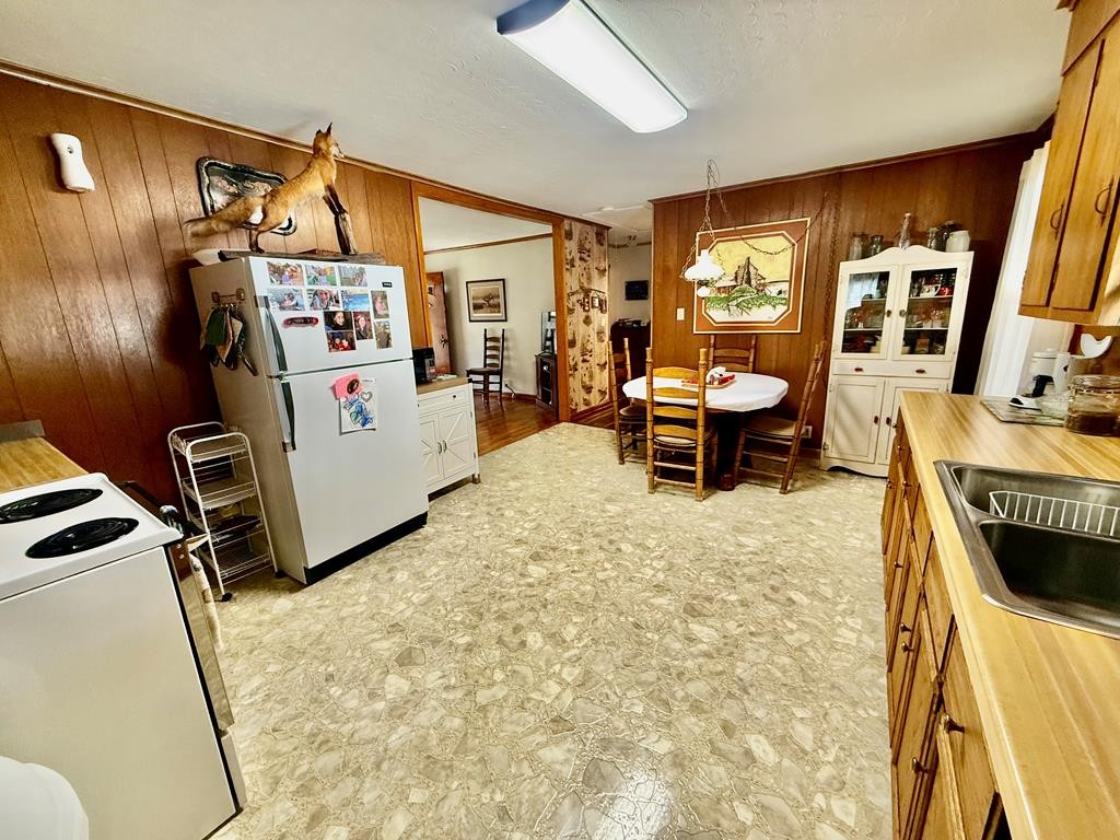 180 Center Drive Springville, TN 38256 - Photo 5 of 30 a living room with furniture and a flat screen tv