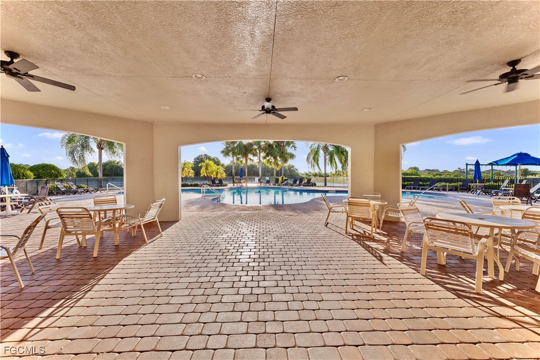 10357 Silver Pond Lane Lehigh Acres, FL 33936 - Photo 22 of 25 a view of a swimming pool and outdoor space