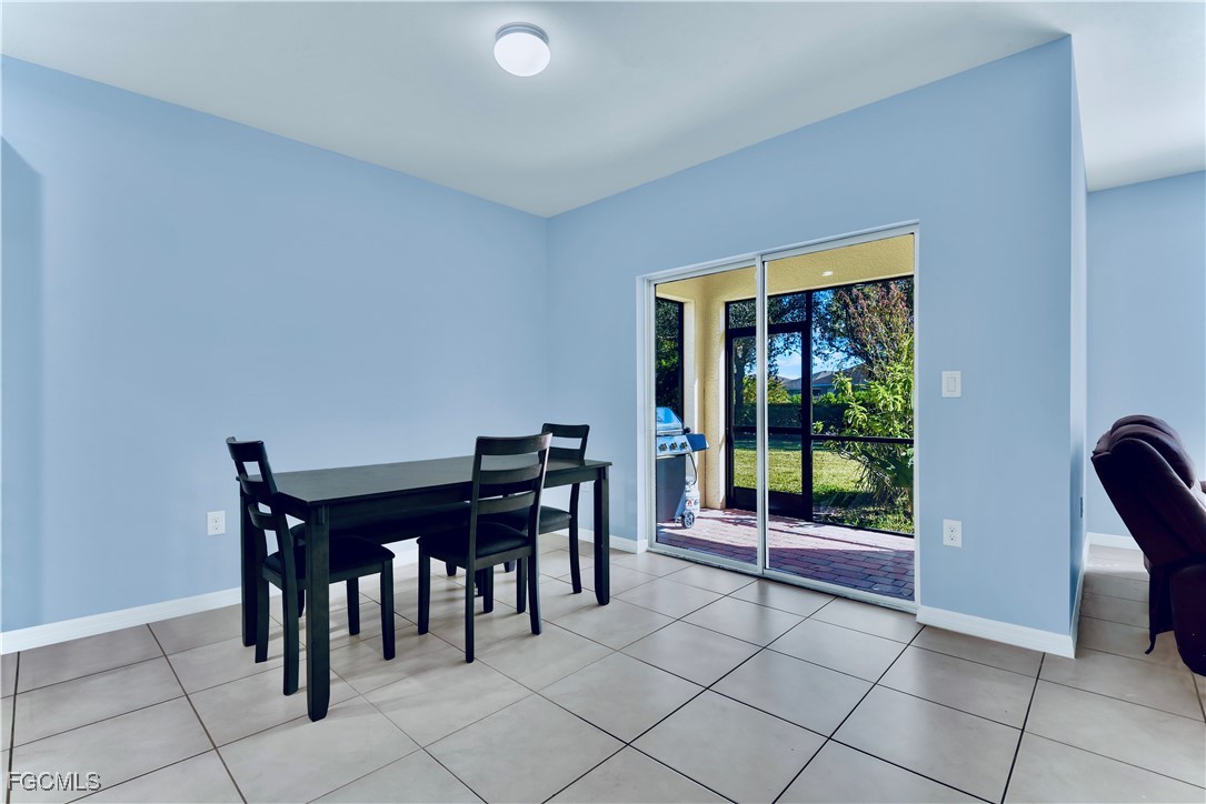 10357 Silver Pond Lane Lehigh Acres, FL 33936 - Photo 8 of 25 a workspace with furniture and window