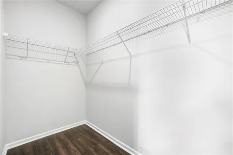 a view of a room with racks on the wall