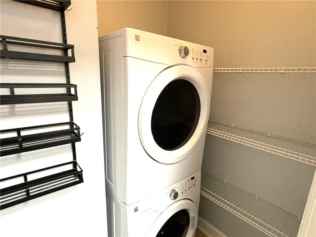 3777 Peachtree Road Northeast, Unit 1517 Atlanta, GA 30319 - Photo 11 of 37 a utility room with dryer and washer