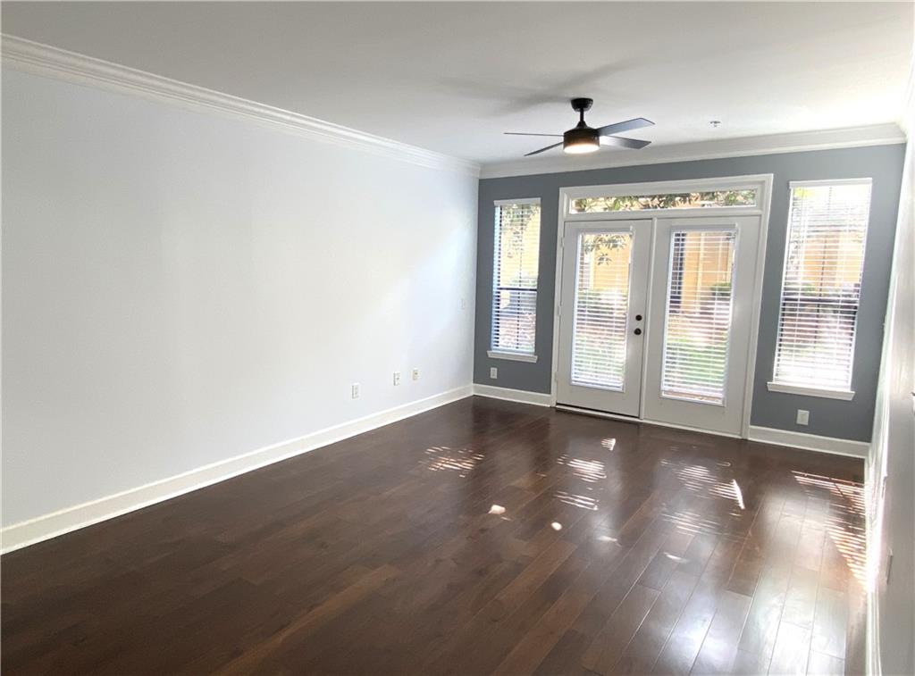 3777 Peachtree Road Northeast, Unit 1517 Atlanta, GA 30319 - Photo 16 of 37 a view of an empty room with a window