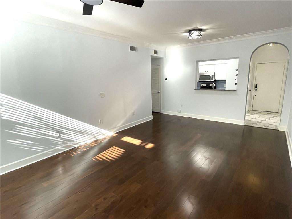 3777 Peachtree Road Northeast, Unit 1517 Atlanta, GA 30319 - Photo 17 of 37 a view of empty room with wooden floor