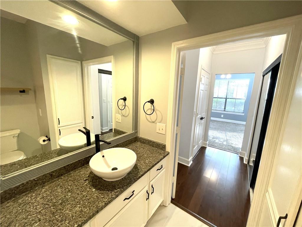3777 Peachtree Road Northeast, Unit 1517 Atlanta, GA 30319 - Photo 27 of 37 a spacious bathroom with sink shower and a mirror