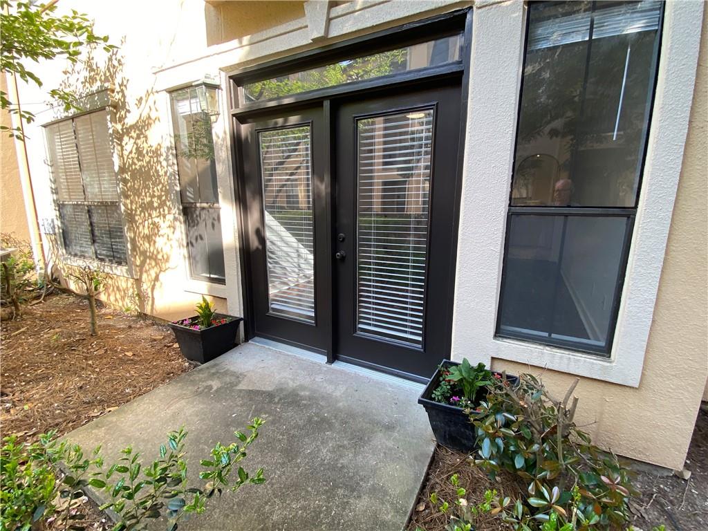 3777 Peachtree Road Northeast, Unit 1517 Atlanta, GA 30319 - Photo 31 of 37 a view of a house with a yard