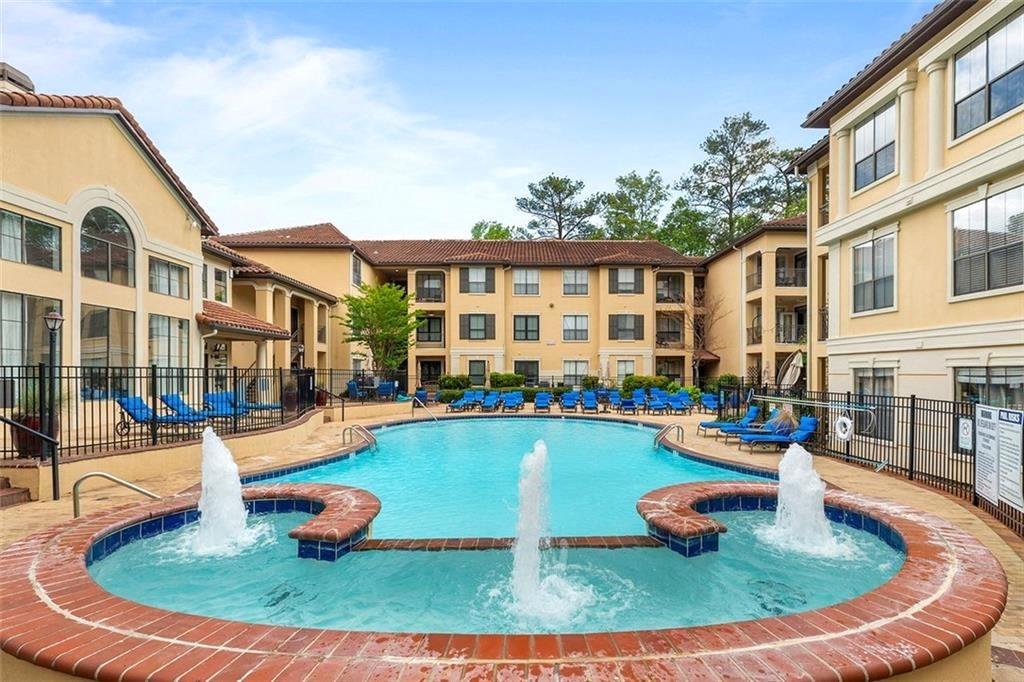 3777 Peachtree Road Northeast, Unit 1517 Atlanta, GA 30319 - Photo 33 of 37 a view of a house with swimming pool and sitting area