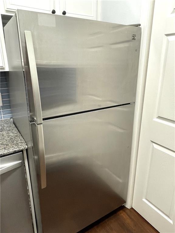 3777 Peachtree Road Northeast, Unit 1517 Atlanta, GA 30319 - Photo 9 of 37 a close view of a refrigerator in kitchen