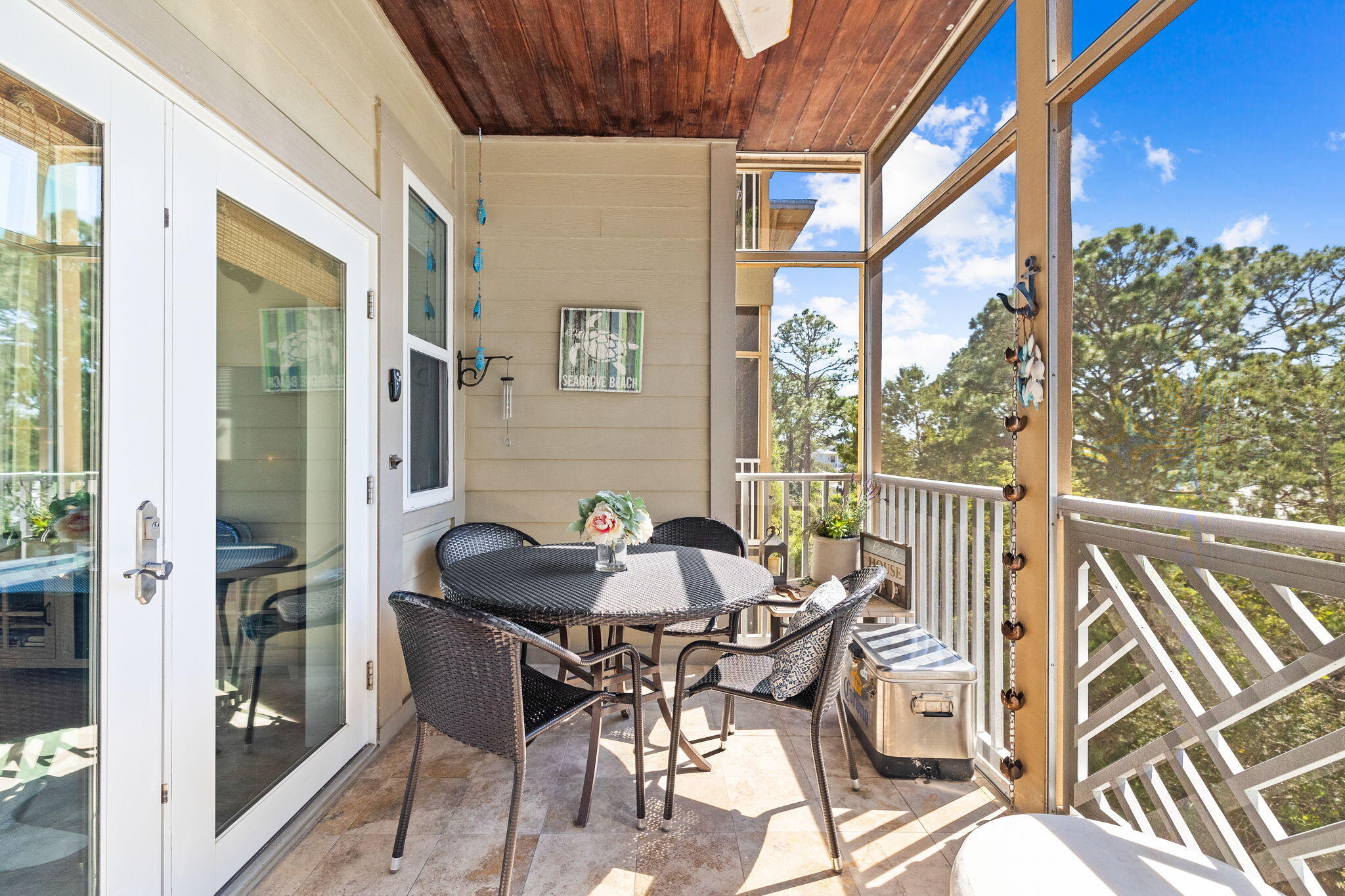231 Somerset Bridge Road, Unit 1301 Santa Rosa Beach, FL 32459 - Photo 18 of 26 a patio with table and chairs
