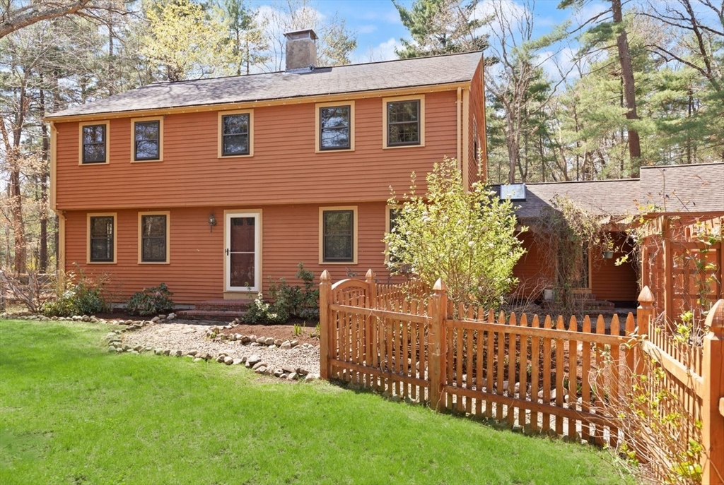 2 Briggs Pond Way Sharon, MA 02067 - Photo 2 of 42 a front view of a house with a garden