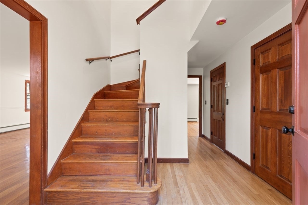 2 Briggs Pond Way Sharon, MA 02067 - Photo 3 of 42 a view of entryway with wooden floor and stairs