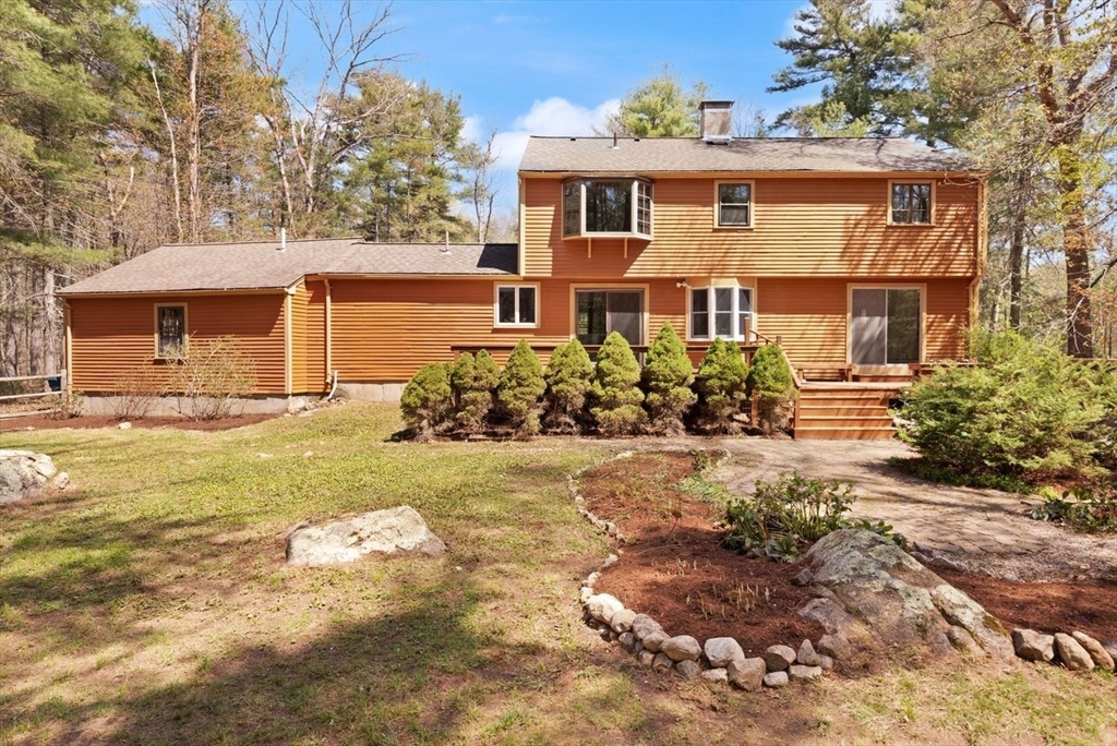 2 Briggs Pond Way Sharon, MA 02067 - Photo 33 of 42 front view of a house with a yard