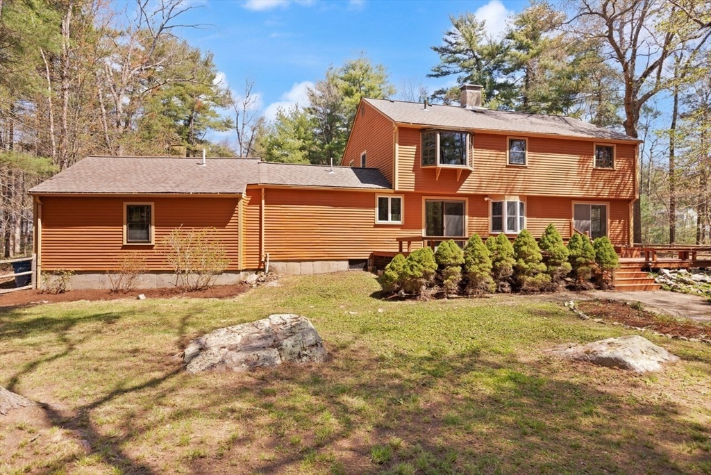 2 Briggs Pond Way Sharon, MA 02067 - Photo 36 of 42 a view of a house with a yard