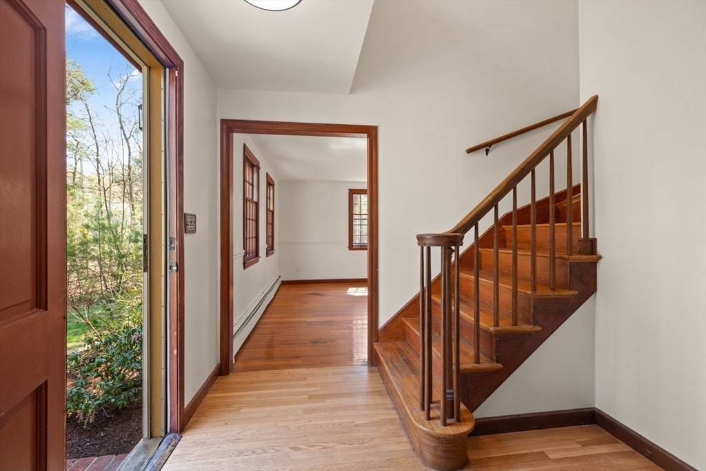 2 Briggs Pond Way Sharon, MA 02067 - Photo 4 of 42 a view of entryway with wooden floor and stairs