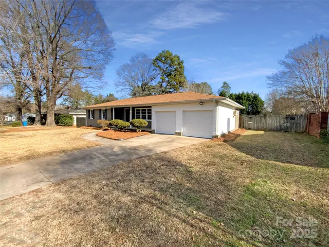 a swimming pool with outdoor seating