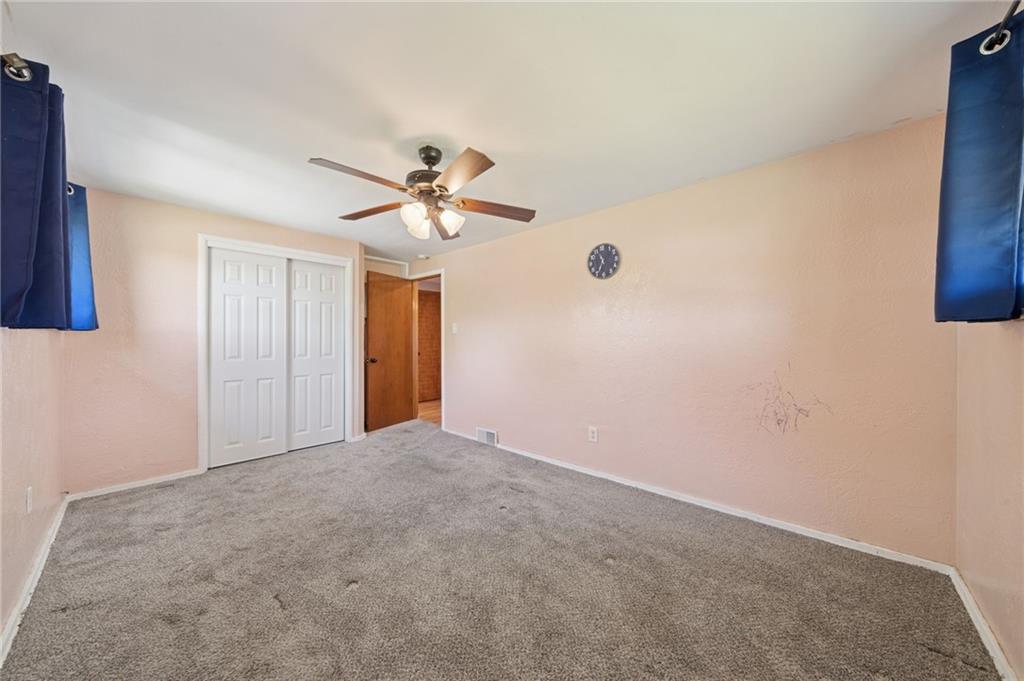 1202 Old Concord Road Monroeville, PA 15146 - Photo 15 of 27 a view of a livingroom with a chandelier fan