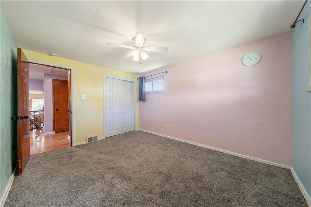 1202 Old Concord Road Monroeville, PA 15146 - Photo 17 of 27 an empty room with closet and fan