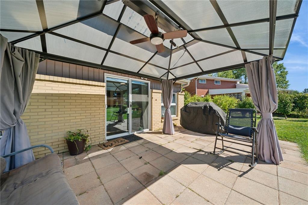 1202 Old Concord Road Monroeville, PA 15146 - Photo 23 of 27 a house view with a sitting space and glass windows